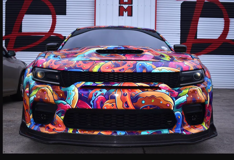 The same car meet photo after Not Your Normal Marketing's color grade